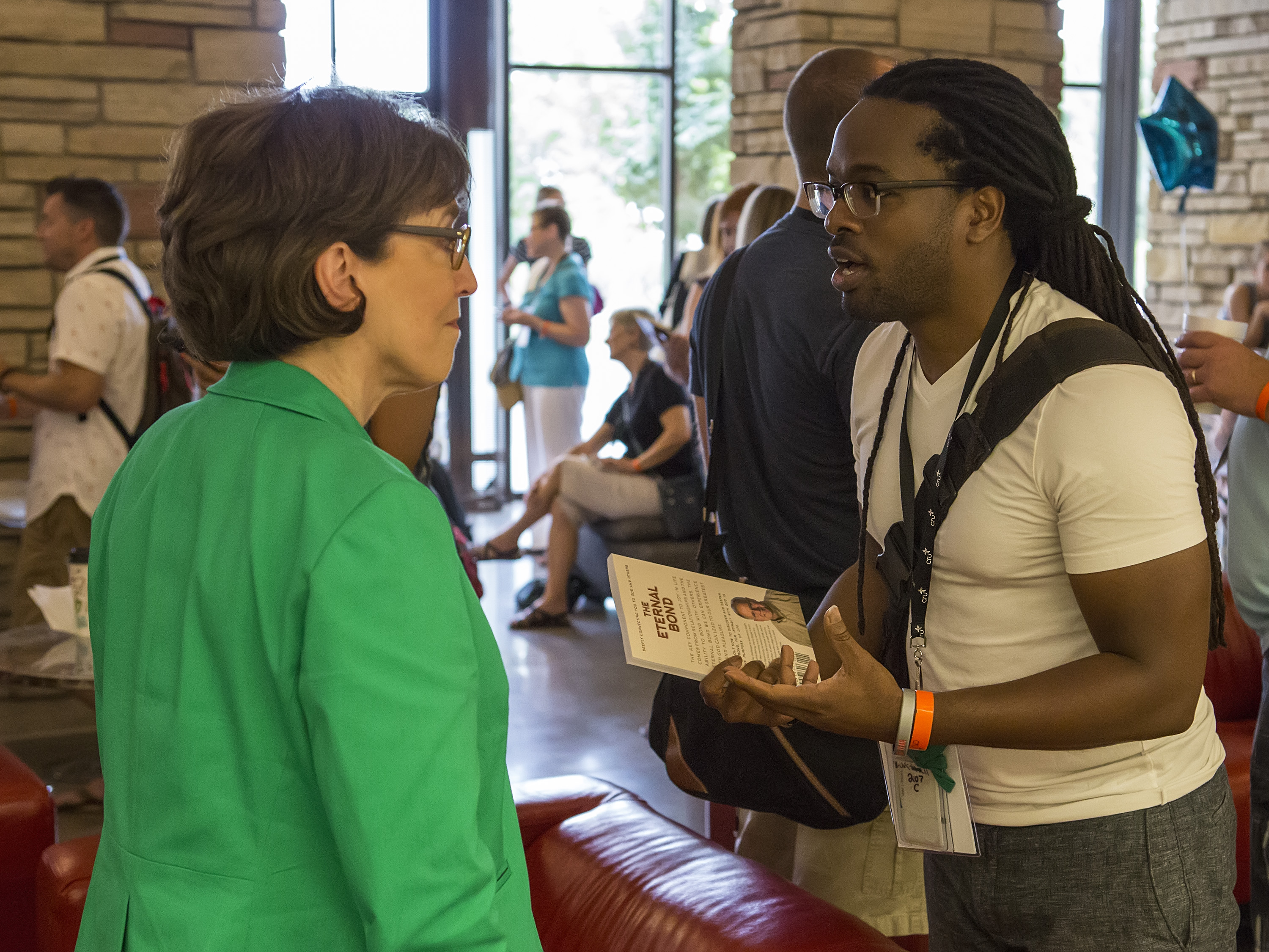 carolyn talking to Rasool Berry